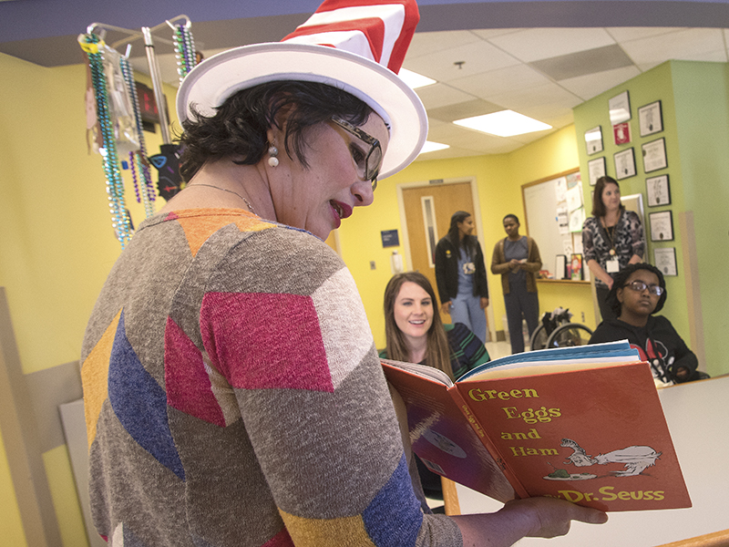  Hospital school teacher Pam Parks-McCord reads "Green Eggs and Ham" to Batson Children's Hospital patients as a celebration of Dr. Seuss' birthday. The beloved children's author was born March 2, 1904.